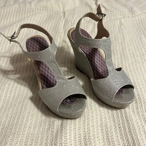 Silver sparkly heels.